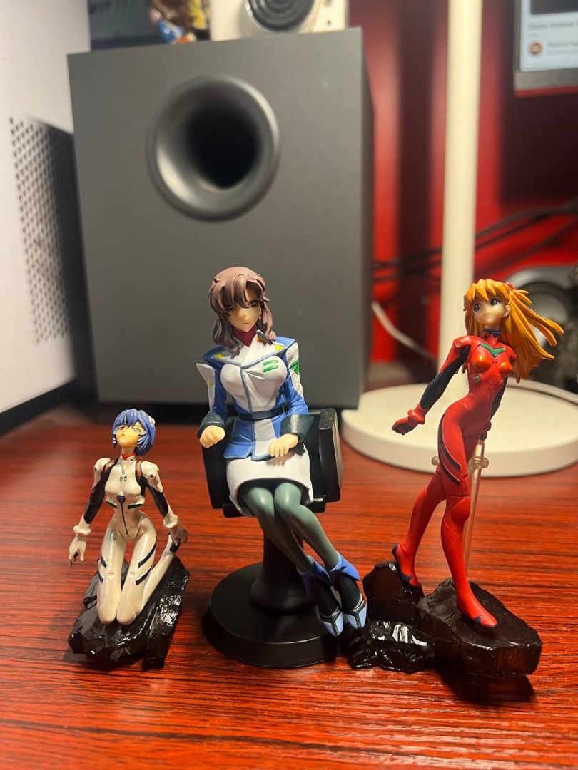 Chix Anime Figurine Set (Category: Figurines & Statues) located in Baguio. Submitted by ditoyzb08176 (Listing ID 1468856814, Image 1). Description: - Set of 3 Neon Genesis Evangelion anime figures - Includes Rei Ayanami kneeling on base, Misato Katsuragi sitting in chair, and Asuka Langley in red plugsuit on rock base - Great for shelf display and collection - Sold as set' Location: Baguio City Shipping: J&T/FLASH/LBC .