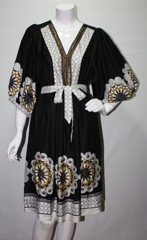 CHLOE BLACK GOLD DRESS (Category: Evening dresses & gowns) located in Marikina City. Submitted by minimalistmanila (Listing ID 1468731470, Image 2). Description: Genuine Chloe festive embellished gold cream dress. With metal accents. Fits medium, 18 inch bust, 38.5 inch length. Never used. Worth P8,500. Order now! .