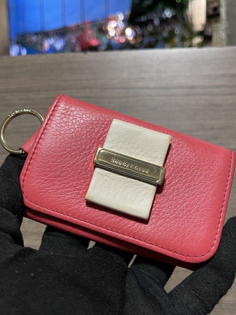 CHLOE Key Holder - See By Chloé (Category: Accessory Holder, Box & Organizers) located in Manila. Submitted by Ms.Joycee (Listing ID 1468849959, Image 1). Description: - Original from Japan - Brand: SeeByChloé - Color: Coral pink shade. - Material: Leather - Features: Comes with a key ring.