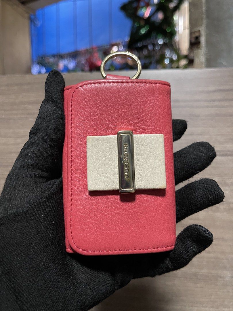 CHLOE Key Holder - See By Chloé (Category: Accessory Holder, Box & Organizers) located in Manila. Submitted by Ms.Joycee (Listing ID 1468849959, Image 2). Description: - Original from Japan - Brand: SeeByChloé - Color: Coral pink shade. - Material: Leather - Features: Comes with a key ring.