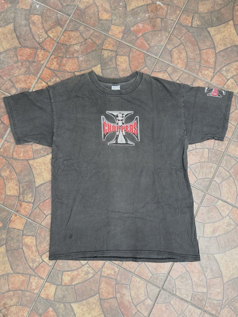 Choppers Biker Iron Cross Graphic Tee (Category: Tshirts & Polo Shirts ) located in Imus. Submitted by mikeythrifts (Listing ID 1468840723, Image 2). Description: - Color/Material: Dark grey heavyweight cotton with a vintage wash fade - Dimes: 21 x 28 - Size: Large (Gildan Ultra Cotton tag) - Design: Bold iron cross and 'Choppers' woman graphic on front and back - Detail: Small logo printed on the left sleeve - Condition: Pre-loved with a cool fa