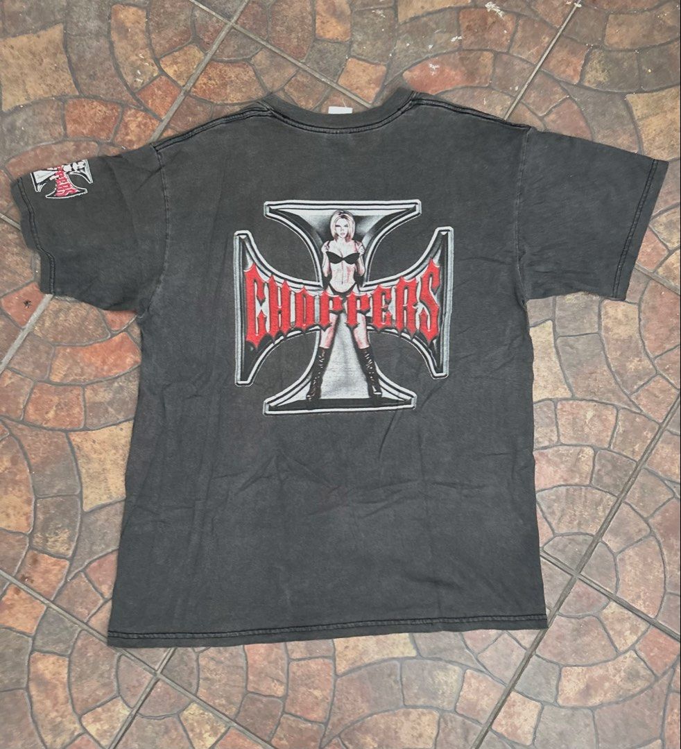 Choppers Biker Iron Cross Graphic Tee (Category: Tshirts & Polo Shirts ) located in Imus. Submitted by mikeythrifts (Listing ID 1468840723, Image 3). Description: - Color/Material: Dark grey heavyweight cotton with a vintage wash fade - Dimes: 21 x 28 - Size: Large (Gildan Ultra Cotton tag) - Design: Bold iron cross and 'Choppers' woman graphic on front and back - Detail: Small logo printed on the left sleeve - Condition: Pre-loved with a cool fa