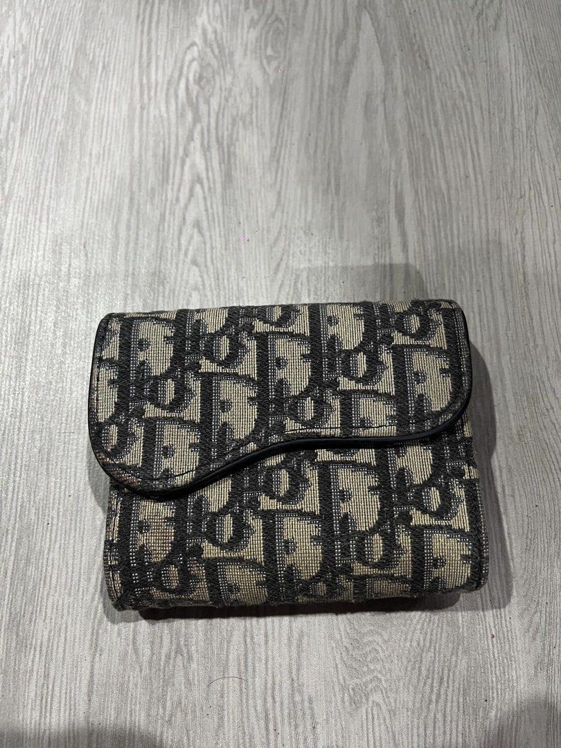 Christian Dior Saddle Oblique Canvass Wallet (Category: Luxury Bags & Wallets) located in Camalaniugan. Submitted by anarchymonopoly052128 (Listing ID 1468915213, Image 1). Description: Issue:Natanggal yung D na nakalawit sa wallet and needs washed Width: 4.5 Inches Length: 3.8 Inches Trifold Length: 9.8 Inches .