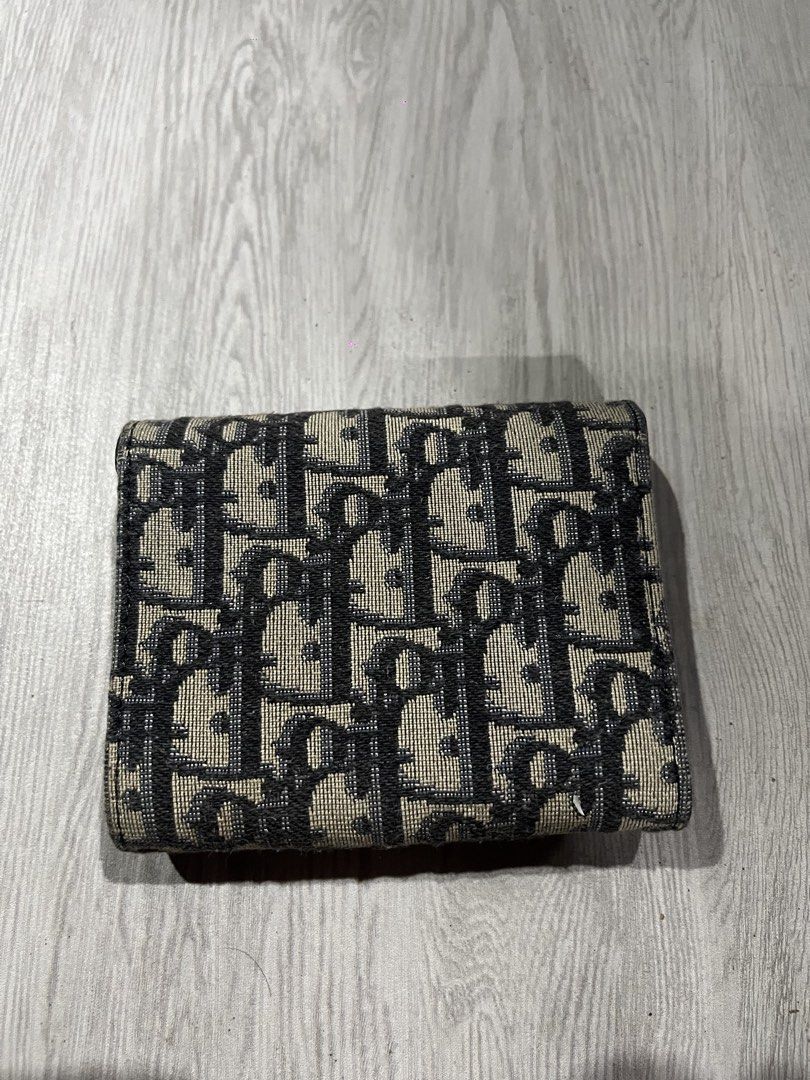 Christian Dior Saddle Oblique Canvass Wallet (Category: Luxury Bags & Wallets) located in Camalaniugan. Submitted by anarchymonopoly052128 (Listing ID 1468915213, Image 2). Description: Issue:Natanggal yung D na nakalawit sa wallet and needs washed Width: 4.5 Inches Length: 3.8 Inches Trifold Length: 9.8 Inches .
