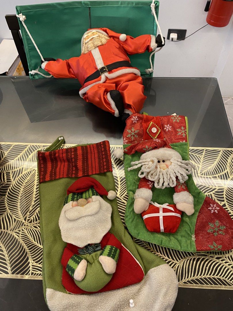 Christmas Decor Bundle (Get all for P550) (Category: Occasions & Party Supplies) located in Taytay. Submitted by mylilpinkcloset (Listing ID 1468718045, Image 1). Description: - All-in-one Christmas decoration bundle in traditional red, green, gold and tree topper - Includes hanging climbing Santa figures and two holiday stockings - Features sparkling red and gold glitter poinsettia flowers .