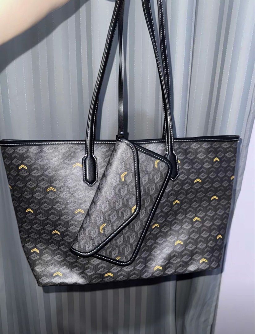 Christy Ng Russo Version 2 (Black) (Category: Tote Bags) located in Manila. Submitted by hannahjac (Listing ID 1468814563, Image 1). Description: - have small dents - with free bag organizer - Daily wear compatible and roomy enough to easily fit laptops and books.