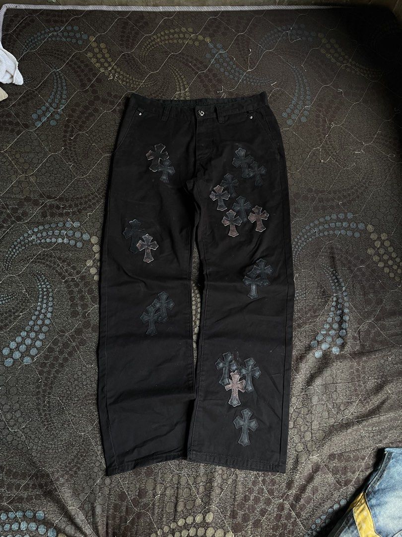Chrome Hearts Cross Patch Black Pants (Category: Jeans) located in Manila. Submitted by chawmichael (Listing ID 1468880468, Image 1). Description: - Black heavy cotton canvas utility trousers - Detailed with leather cross patches scattered down the front and back - Button fly with custom silver scroll buttons and branded hardware - Rear pockets feature leather piping and a metal scroll logo plate - Straight leg fit for a clean silhouette - Condit