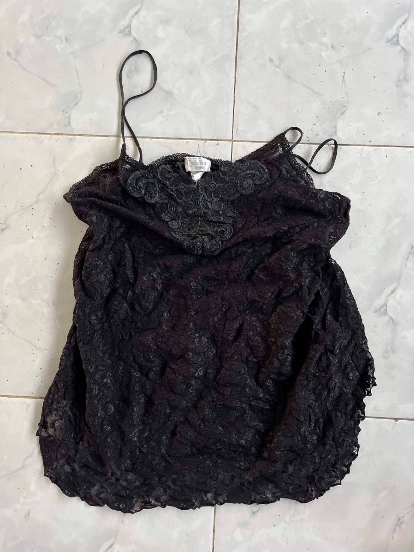 Cinema Etoile Black Lace Camisole (Category: Sleeveless) located in Caloocan City. Submitted by kimronnel (Listing ID 1468882113, Image 1). Description: - Brand: Cinema Etoile - Color: Classic Black - Details: Intricate embroidered lace panel at the neckline - Straps: Thin spaghetti straps - Material: Textured lace fabric with slight stretch - Fit: Relaxed and comfortable through the body.