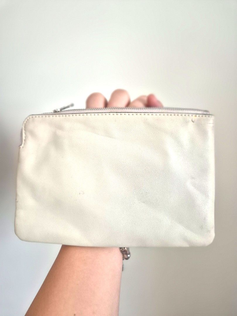 CK pouch (Category: Purses & Pouches) located in Manila. Submitted by mommynurse (Listing ID 1468789245, Image 3). Description: Original CK pouch but with flaws..