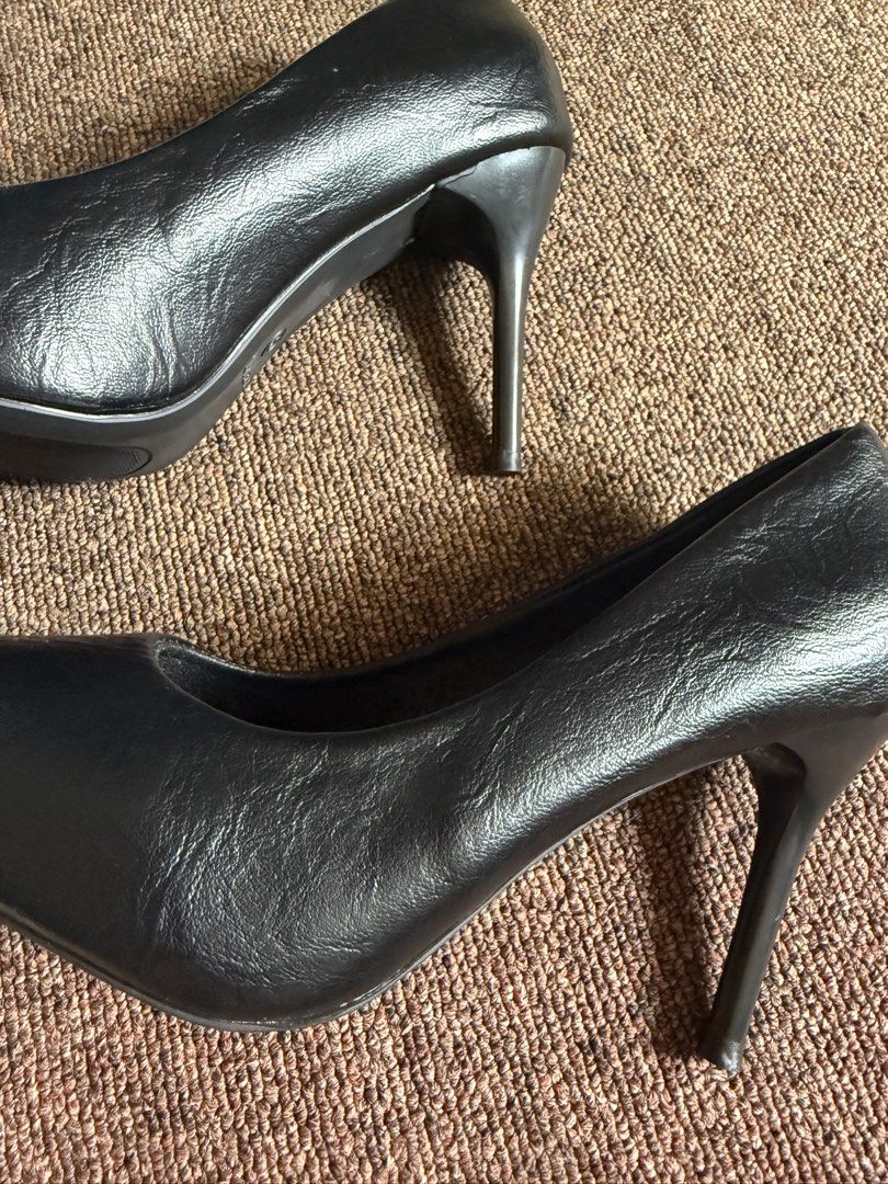 Classic Black Pointed Toe Stiletto High Heels (Category: Heels) located in Cagayan de Oro. Submitted by redbluerider (Listing ID 1468780150, Image 3). Description: - Color: Classic Black - Size: 38 - Style: Pointed toe slip-on stiletto heels - Material: Textured synthetic leather - Sole: Sturdy textured rubber for extra grip - Versatility: Perfect staple pair for both workwear and evening outfits Price is negotiable.