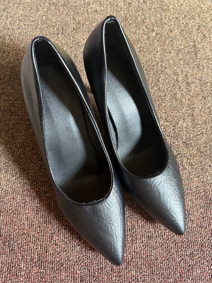 Classic Black Pointed Toe Stiletto High Heels (Category: Heels) located in Cagayan de Oro. Submitted by redbluerider (Listing ID 1468780150, Image 2). Description: - Color: Classic Black - Size: 38 - Style: Pointed toe slip-on stiletto heels - Material: Textured synthetic leather - Sole: Sturdy textured rubber for extra grip - Versatility: Perfect staple pair for both workwear and evening outfits Price is negotiable.