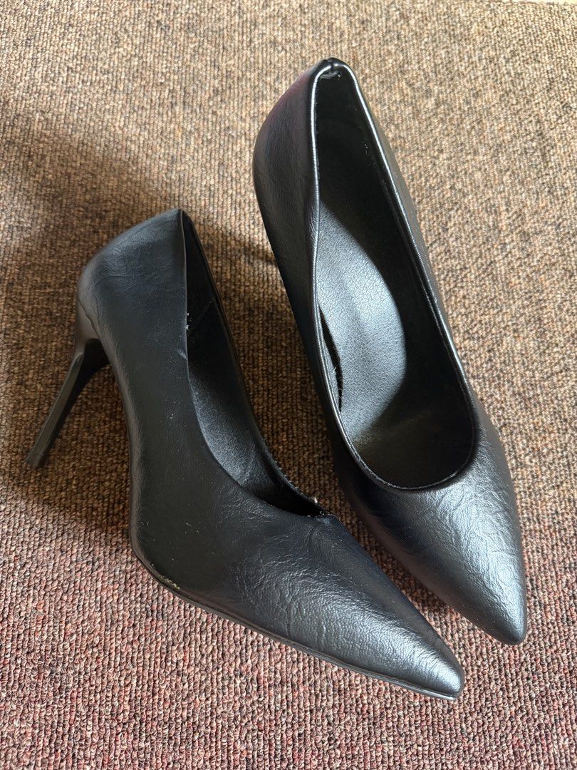 Classic Black Pointed Toe Stiletto High Heels (Category: Heels) located in Cagayan de Oro. Submitted by redbluerider (Listing ID 1468780150, Image 1). Description: - Color: Classic Black - Size: 38 - Style: Pointed toe slip-on stiletto heels - Material: Textured synthetic leather - Sole: Sturdy textured rubber for extra grip - Versatility: Perfect staple pair for both workwear and evening outfits Price is negotiable.