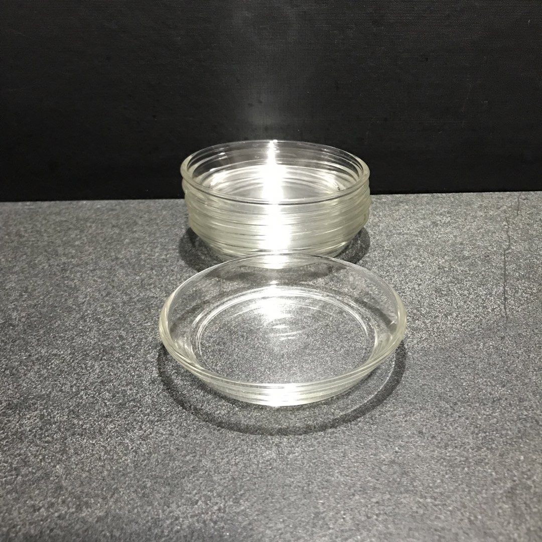 Clear Glass Small Dishes/Coasters (Category: Dinnerware & Cutlery) located in Baao. Submitted by all.things.japan (Listing ID 1468748635, Image 2). Description: 2 dozens available P180.00 per half dozen - Set of 6 matching clear glass small dishes - Stackable design saves valuable cupboard space - Simple round shape featuring slightly raised rims - Perfect for food prep, sauces, condiments, or holding small trinkets.