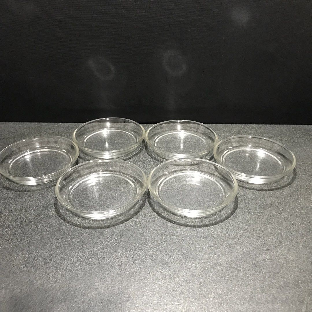 Clear Glass Small Dishes/Coasters (Category: Dinnerware & Cutlery) located in Baao. Submitted by all.things.japan (Listing ID 1468748635, Image 1). Description: 2 dozens available P180.00 per half dozen - Set of 6 matching clear glass small dishes - Stackable design saves valuable cupboard space - Simple round shape featuring slightly raised rims - Perfect for food prep, sauces, condiments, or holding small trinkets.