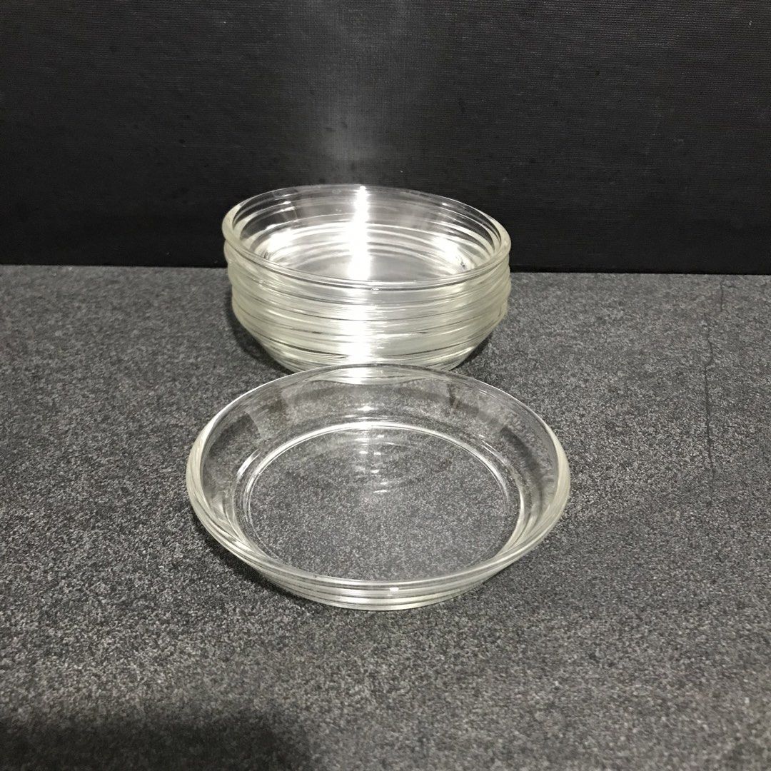 Clear Glass Small Dishes/Coasters (Category: Dinnerware & Cutlery) located in Baao. Submitted by all.things.japan (Listing ID 1468748635, Image 3). Description: 2 dozens available P180.00 per half dozen - Set of 6 matching clear glass small dishes - Stackable design saves valuable cupboard space - Simple round shape featuring slightly raised rims - Perfect for food prep, sauces, condiments, or holding small trinkets.