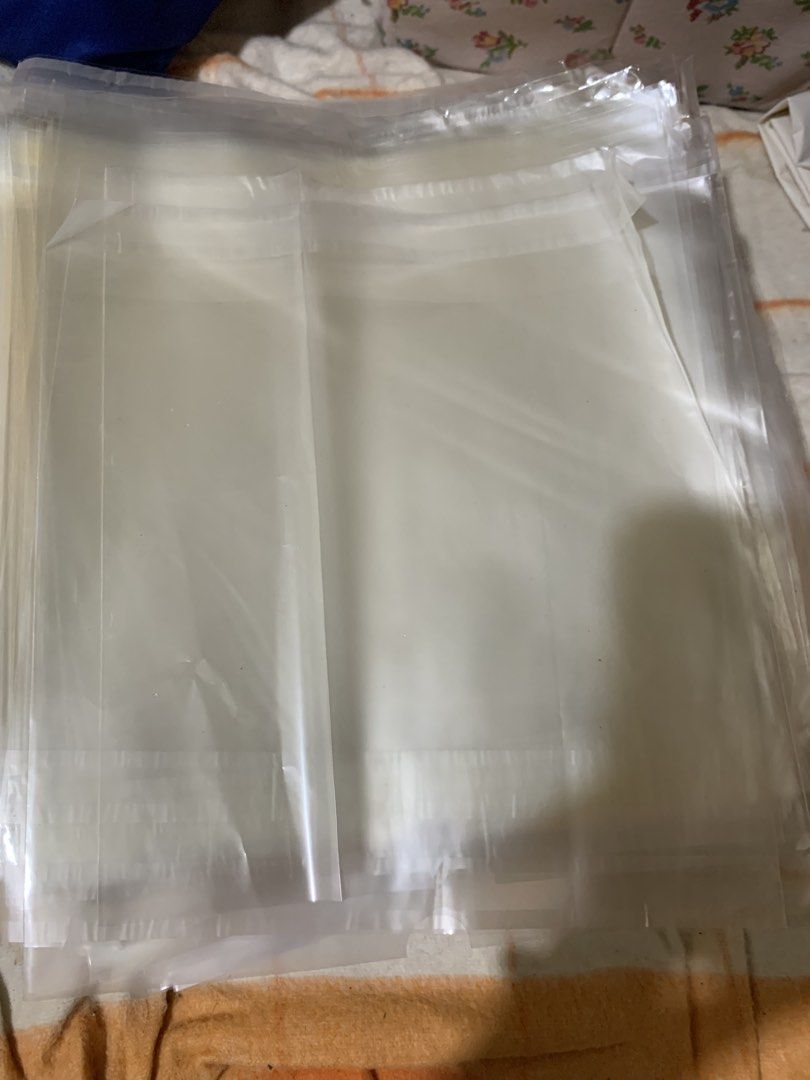 Clear self-adhesive plastic packaging bags (Category: Craft Supplies & Tools) located in Malolos. Submitted by rubyche88 (Listing ID 1468831250, Image 2). Description: - Clear self-sealing plastic bags - Convenient sticky seal strip at the top - Great for shipping clothes and apparel - Ideal for organizing small items - Protects cards, crafts, and collectibles - Transparent design for easy viewing - 1500 pcs.