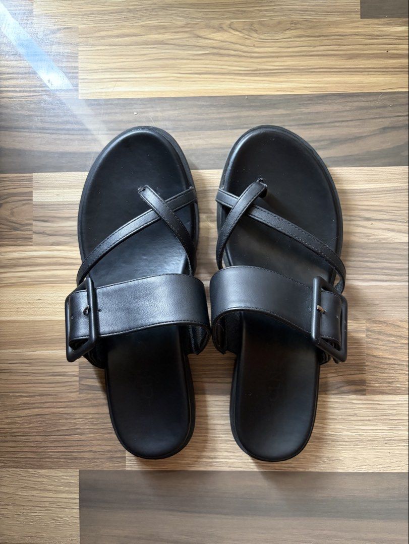 CLN Black buckle strap flat sandals (Category: Flats & Sandals) located in Los Banos. Submitted by _bugsssbunny (Listing ID 1468726271, Image 1). Description: CLN Black flat sandals - Details: Wide top strap with large square buckle, thin thong-style toe straps - Condition: Clean footbeds, minimal wear on soles - Features: Comfortable flat soles, great for everyday wear in warm weather.