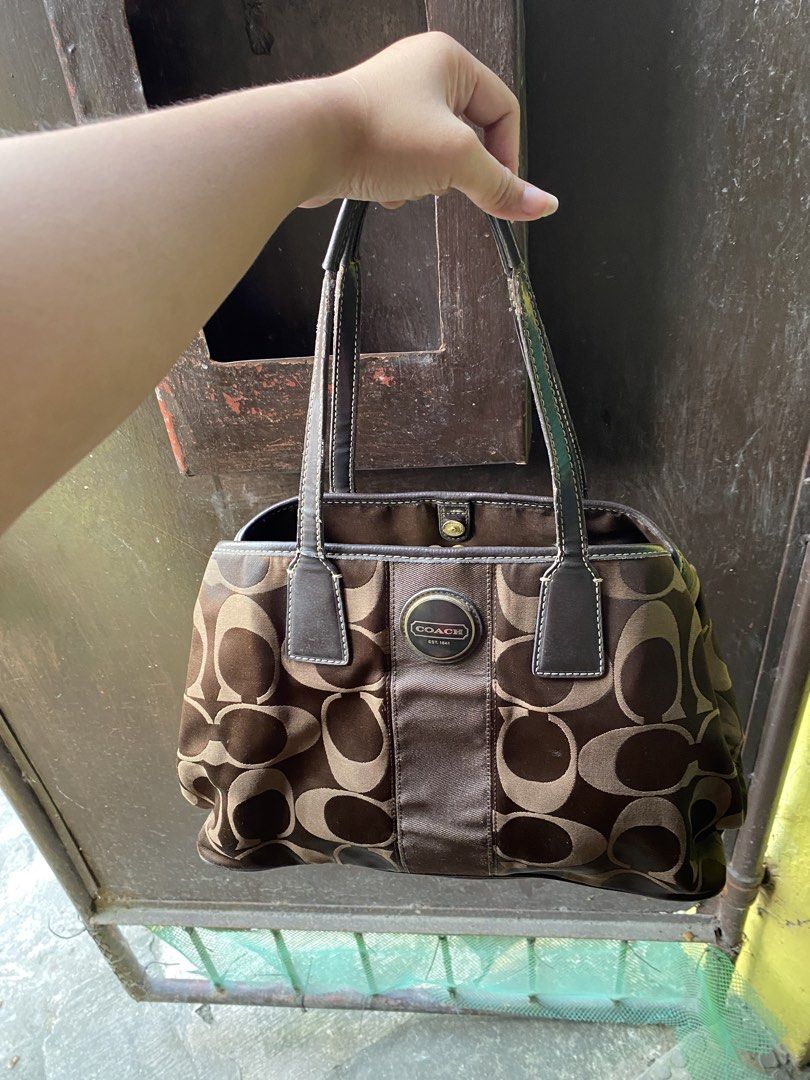 Coach Bag (Category: Luxury Bags & Wallets) located in Cainta. Submitted by peaches_2021 (Listing ID 1468836501, Image 2). Description: Rank AB Condition With normal signs of use especially with the strap No hangtag that's why selling low Dm if interested!.