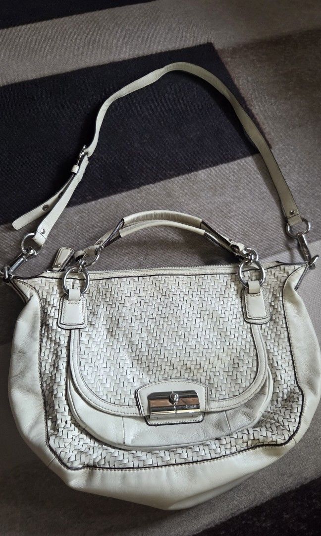 Coach Kristin Woven Leather Bag 19312 (Category: Cross-body Bags) located in Pagudpud. Submitted by jmpascual044757 (Listing ID 1468763516, Image 1). Description: 100% guaranteed original!! preloved not ukay made in china flaws: have washable stains inside zipper puller has slight rub strap has different hardware all leather intact expect light sign of usage not for the maarte and barat! no free sf price initially posted for 2500 reduced to 2000 