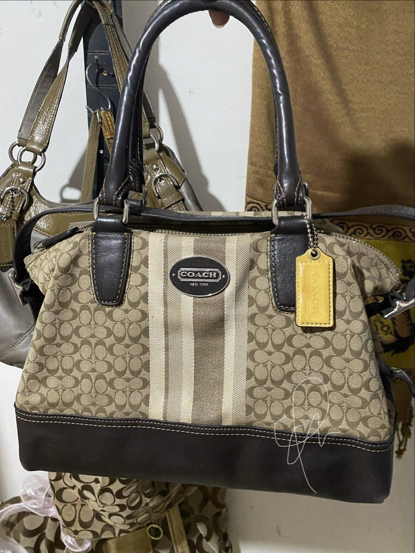 Coach Legacy Signature Stripe (Category: Tote Bags) located in Legazpi City. Submitted by goldenfish.d18172 (Listing ID 1468808563, Image 2). Description: Declutterring! Has minima issues sa leather and patent strap (see photos for ref) Minimal yellow stain (unnoticable) Replaced hangtag .