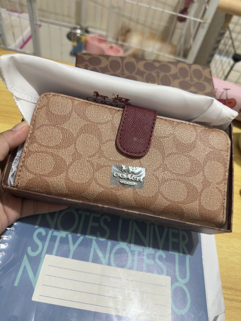 Coach Long Wallet (Category: Wallets & Card holders) located in Binmaley. Submitted by amayscollections (Listing ID 1468850237, Image 1). Description: Sale Coded Coach Long Wallet with box and dustbag ganda ganda ses! For only: ₱550+sf payment first ₱620+sf cash on delivery 📍Pangasinan We Ship Nationwide po🚚.