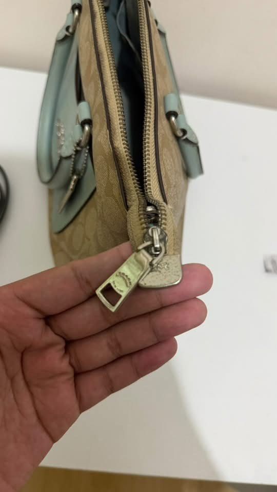 Coach Mini Emma Satchel (Category: Cross-body Bags) located in Manila. Submitted by jln888 (Listing ID 1468757270, Image 3). Description: Coach Mini Emma Satchel Bought in US 🇺🇸 - Authentic Coach Satchel - Signature Canvas with Sea Foam Blue Leather - Top zipper closure - Double handle - Adjustable shoulder straps - Includes Coach Tag - Can be used as a handbag or crossbody bag .