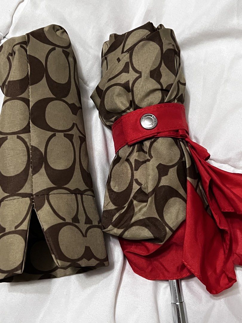 Coach Umbrella (Category: Umbrellas) located in Paranaque City. Submitted by closetclub308 (Listing ID 1468833017, Image 2). Description: Coach Umbrella Brandnew with tag Never used/ only opened to check No issues. Lightweight perfect for your everyday use Authentic from USA .
