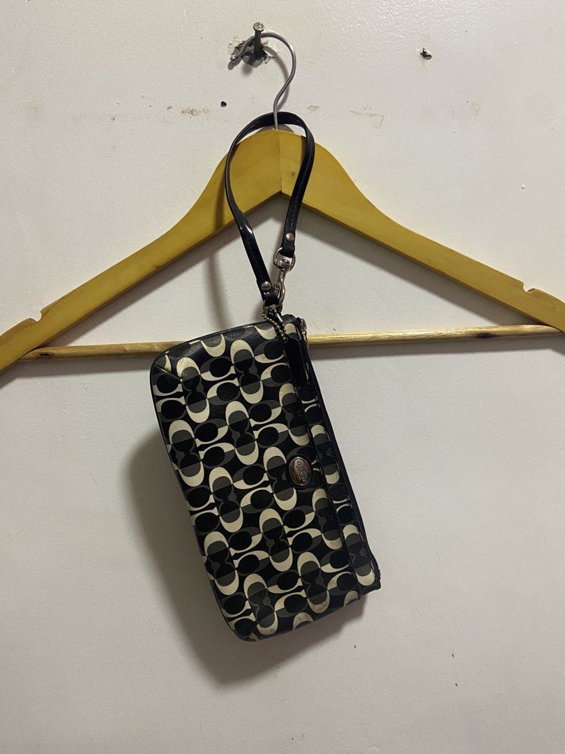 Coach wristlet (Category: Wallets & Card holders) located in Cagayan de Oro. Submitted by timeless_trends (Listing ID 1468819777, Image 2). Description: dm for more details .