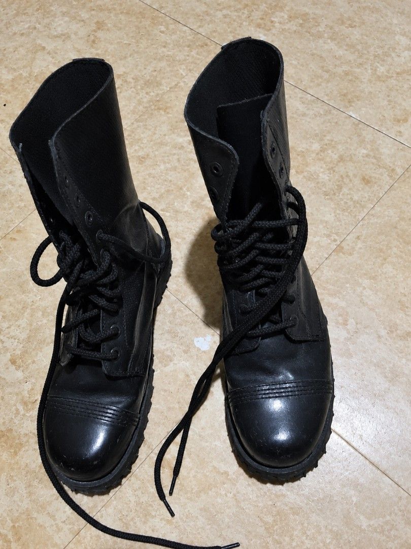 Combat Boots (Category: Boots) located in Binan City. Submitted by xmdnightfae (Listing ID 1468859628, Image 2). Description: Color: Black Style: Combat / Military / Gothic / Grunge Design: High-cut boots with lace-up closure and thick, rugged soles Details: Glossy toe caps and classic lace-up design Style inspiration: Y2K, punk, alternative, and streetwear fashion.