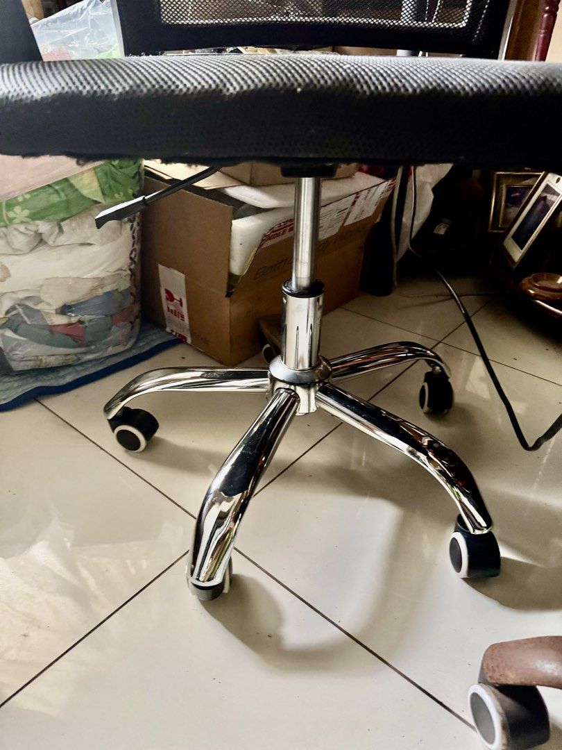 Computer Chair (swivel) with Armrests (Category: Office Furniture & Fixtures) located in Manila. Submitted by clarovida888 (Listing ID 1468742842, Image 2). Description: - Color: Black - Material: Breathable mesh backrest and seat - Support: Sturdy armrests on both sides - Mobility: Smooth-rolling wheels on a chrome base - Function: Fully working adjustable height mechanism - Condition: Clean, well-maintained, and ready for immediate use Reason f