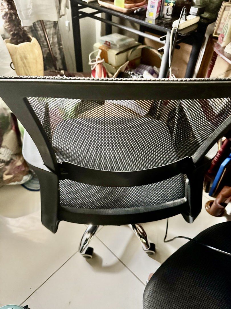 Computer Chair (swivel) with Armrests (Category: Office Furniture & Fixtures) located in Manila. Submitted by clarovida888 (Listing ID 1468742842, Image 3). Description: - Color: Black - Material: Breathable mesh backrest and seat - Support: Sturdy armrests on both sides - Mobility: Smooth-rolling wheels on a chrome base - Function: Fully working adjustable height mechanism - Condition: Clean, well-maintained, and ready for immediate use Reason f