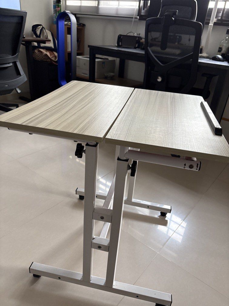 Computer Table-Adjustable (Category: Tables & Sets) located in Singapore. Submitted by lim101482 (Listing ID 1468732611, Image 1). Description: 2 sets of computer table .Good for kids study desk.Adjustable height.Buy 1 get 1 free.