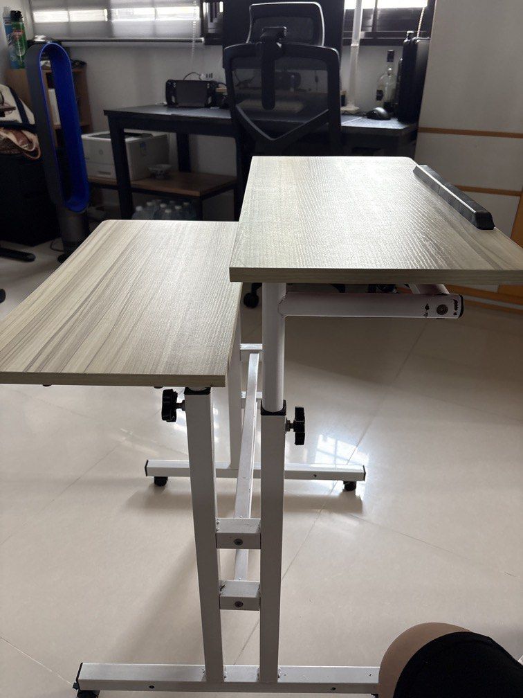 Computer Table-Adjustable (Category: Tables & Sets) located in Singapore. Submitted by lim101482 (Listing ID 1468732611, Image 2). Description: 2 sets of computer table .Good for kids study desk.Adjustable height.Buy 1 get 1 free.