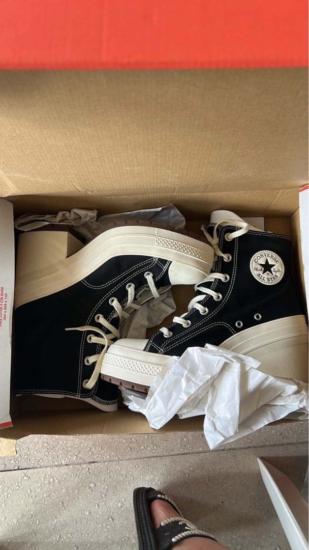 Converse Chuck 70 De Luxe Heel (Category: Sneakers) located in Manila. Submitted by freya_890 (Listing ID 1468797293, Image 1). Description: - Original - Brand: Converse - Style: Black canvas high top sneakers with thick platform soles and chunky heels - Details: White laces, contrast stitching, classic circular ankle patch, and lugged rubber outsoles for grip - Condition: Brand new, still neatly packed in the original shoebox with protective tis