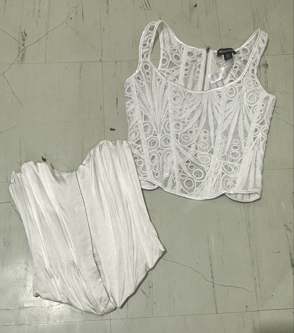Corset top bundle (prettylittlething + zara) (Category: Sleeveless) located in Zamboanga. Submitted by thriftie.zam (Listing ID 1468839115, Image 1). Description: - Set of 2 chic white tops: PrettyLittleThing lace corset top & Zara corset top - PrettyLittleThing Top: UK size 6 / US size 2, featuring a back zip - Zara Corset Top: EUR XS / USA XS, featuring front hook-and-eye closures Zara with flaw INSIDE, di klaro pag gamitin. Prettylittlething n