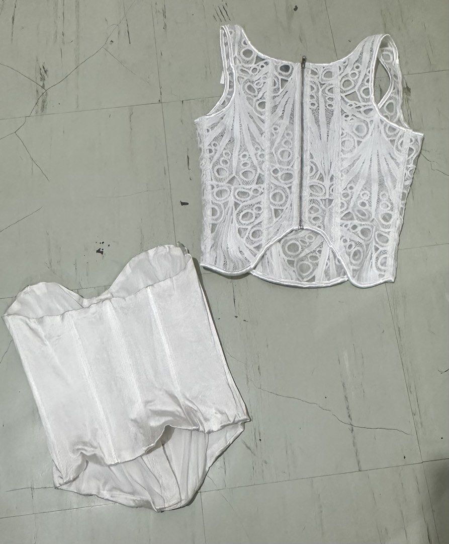 Corset top bundle (prettylittlething + zara) (Category: Sleeveless) located in Zamboanga. Submitted by thriftie.zam (Listing ID 1468839115, Image 2). Description: - Set of 2 chic white tops: PrettyLittleThing lace corset top & Zara corset top - PrettyLittleThing Top: UK size 6 / US size 2, featuring a back zip - Zara Corset Top: EUR XS / USA XS, featuring front hook-and-eye closures Zara with flaw INSIDE, di klaro pag gamitin. Prettylittlething n