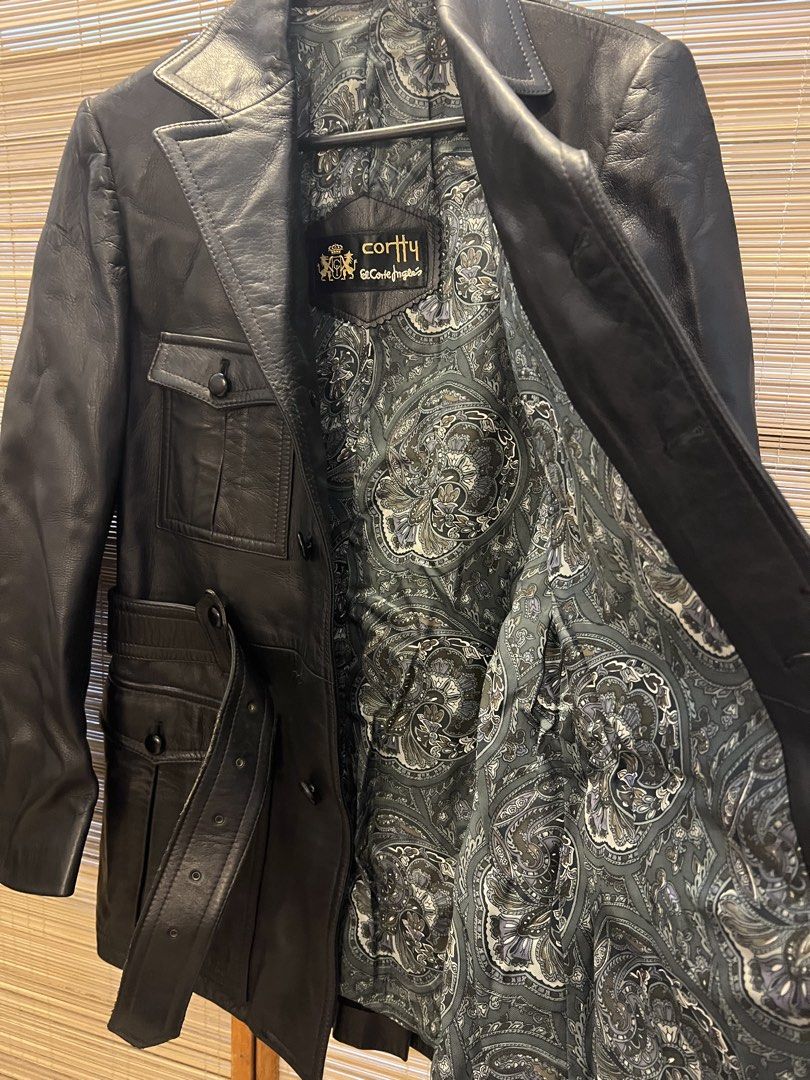 Cortty El Corte Inglés Leather Jacket Black (Category: Coats, Jackets and Outerwear) located in Manila. Submitted by noblecrystal_ff870c (Listing ID 1468745616, Image 2). Description: - Brand/Maker: Cortty by El Corte Inglés - Material: Genuine black leather with stunning green and grey paisley lining - Features: Multiple front flap pockets and matching waist belt - Closure: Classic button closure - Style: Great statement piece for cooler weather