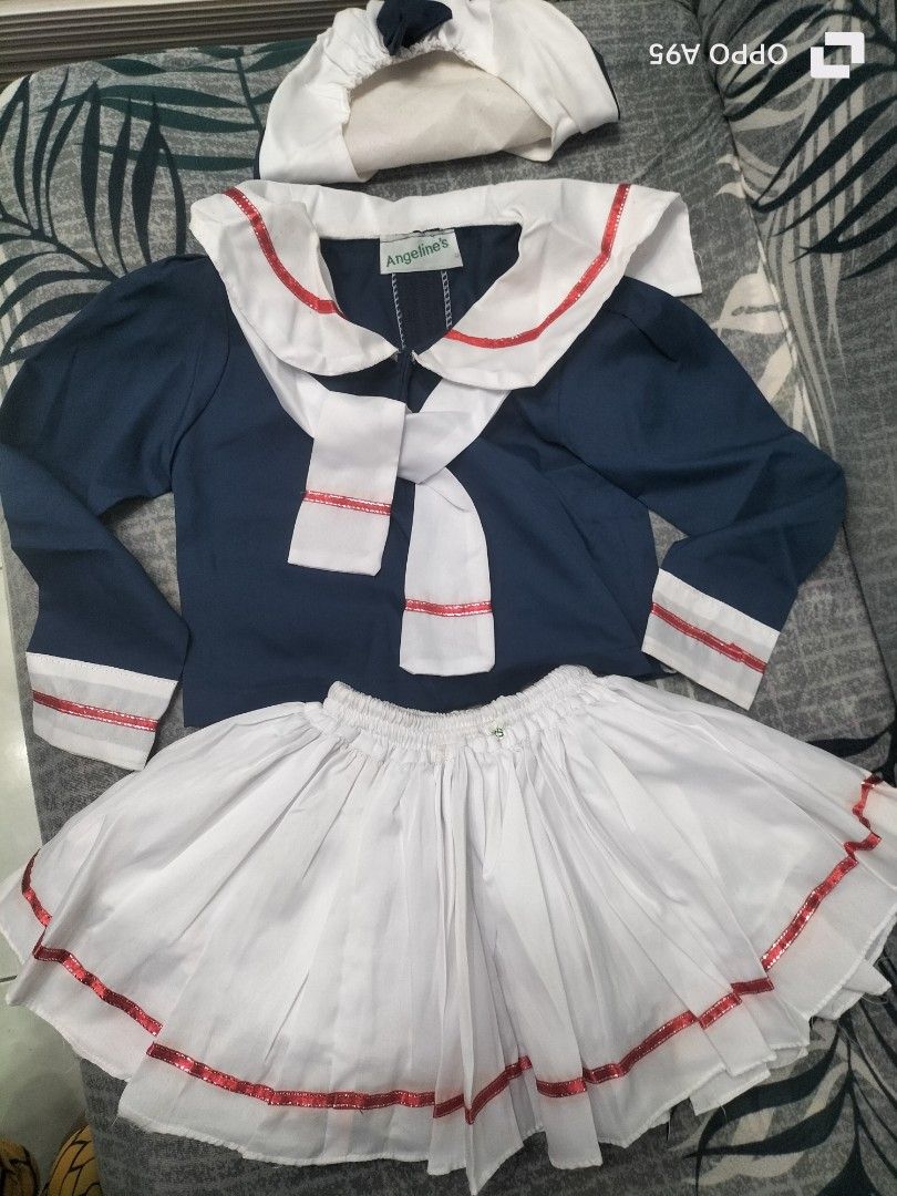 Costume Bundle Traditional Multi-colour Dress Sailor Uniform Devil Cloak (Category: Sets or Coordinates) located in Quezon City. Submitted by boybits1 (Listing ID 1468718480, Image 3). Description: Bawas gamit: Assorted costume for kids - Multi-item costume collection, selling everything as a set - Indigenous-style set: Traditional red-striped top, skirt, and feather accessories - Sailor set: Blue and white top, skirt, and cap with brand tag - De