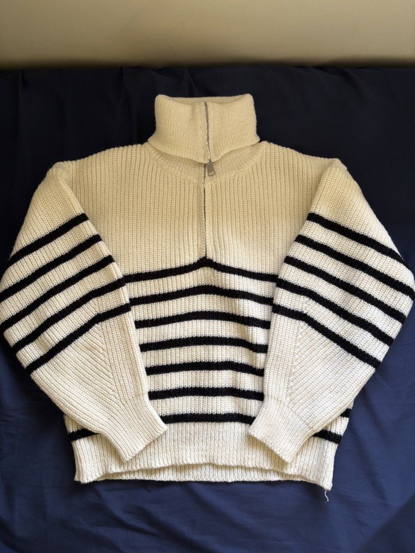 Cream and Black Striped Turtleneck Zip Sweater (Category: Coats, Jackets and Outerwear) located in Manila. Submitted by prelovedbykleng (Listing ID 1468850445, Image 1). Description: Fits M-L - Cream knitted sweater with black horizontal stripes - Functional silver-tone metal zipper on the ribbed turtleneck - Thick rib knit texture on cuffs and hemline - Heavyweight, cozy cotton blend material.