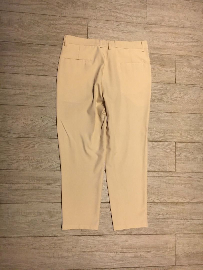 Cream Beige Casual Tailored Trousers (Category: Trousers) located in Manila. Submitted by grnickkk (Listing ID 1468759988, Image 3). Description: - Color: Cream beige - Style: Tailored trousers with straight leg cut and clean front - Features: Belt loops and functional side pockets - Versatility: Ideal for work meetings or smart casual outings - Pairing: Matches effortlessly with button-up shirts or basic tees - Condition: Brand new / Excellent.
