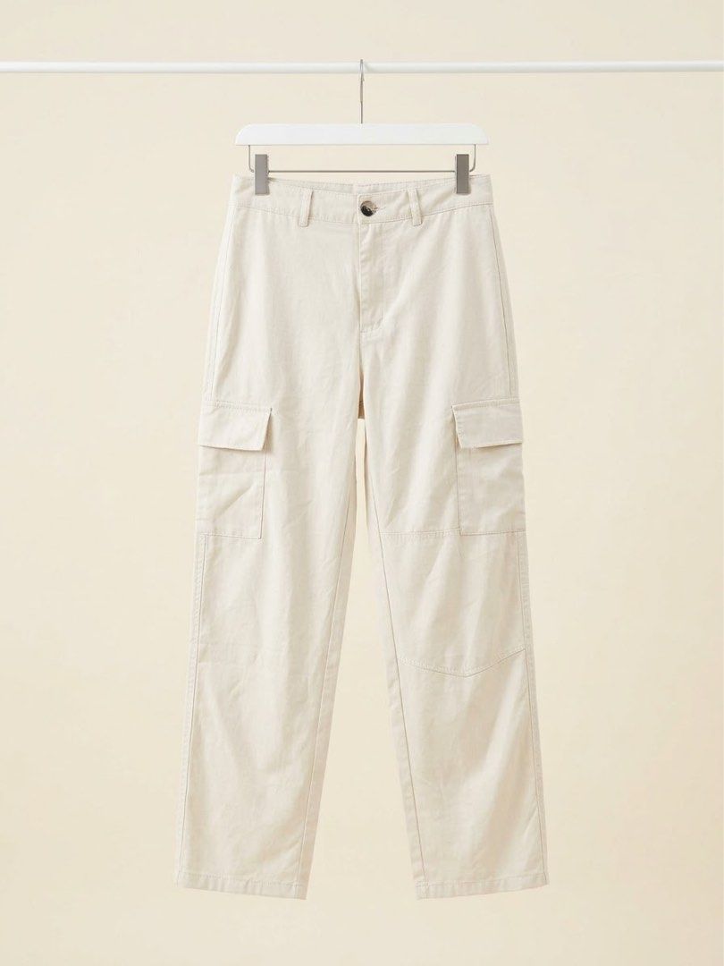Cream Cargo Trousers Utility Pants (Category: Jeans) located in Villasis. Submitted by juliaxgamboa (Listing ID 1468808246, Image 1). Description: - Color: Cream - Style: High-waisted utility trousers with straight legs - Pockets: Side cargo pockets and two back welt pockets - Closure: Button closure with zipper fly - Features: Includes belt loops, neutral color fits most tops - Condition/Use: Great for casual outings or running errands.