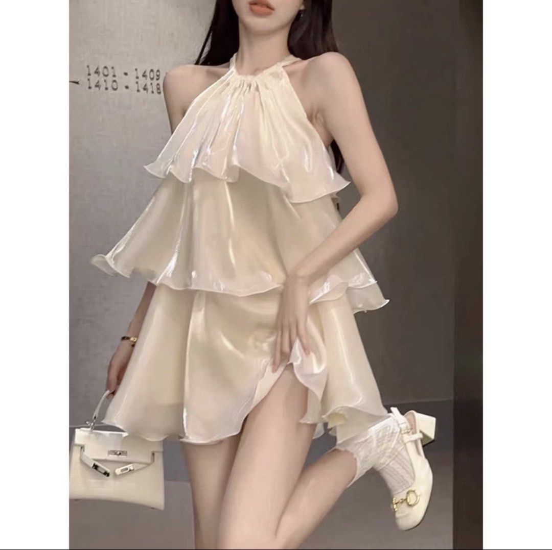 Cream Halter Tiered Ruffle Mini Dress (Category: Dresses) located in Manila. Submitted by reinetxnx (Listing ID 1468734688, Image 2). Description: Size: Small (see pic for reference) Bust: 32-34 Waist: 23-29 Hips: 34-39 Actual when worn on pic Reference: Height - 5’1 Waist - 25 Bust - 36 Used ONCE Location: Mandaluyong Avail Same day delivery via Grab/Lalamove (shouldered by buyer).