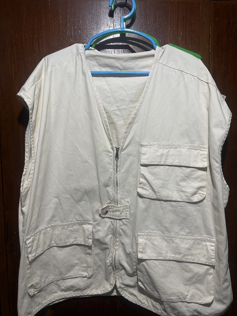 Cream Utility Vest with Multiple Pockets and Zipper (Category: Vests) located in Quezon City. Submitted by tryvestz (Listing ID 1468801370, Image 1). Description: Can fit medium to large Cream utility vest in a relaxed fit. Features a full front zipper, button tab detail, and four large front pockets. Sleeveless and versatile, perfect for layering over tees or hoodies..