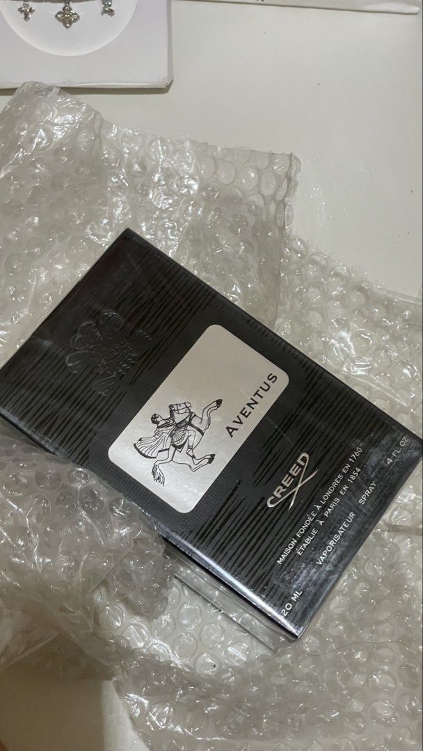 Creed Aventus Fragrance Spray (Category: Fragrance & Deodorants) located in Bacoor. Submitted by kendallgender (Listing ID 1468920644, Image 1). Description: - Brand: Creed (class a only) - Fragrance: Aventus Eau de Parfum - Bottle Size: 120 ml - Packaging: Brand new - Design: Classic black bottle with silver label featuring the horse and rider emblem - Status: Ready to ship, grab it before it goes!.
