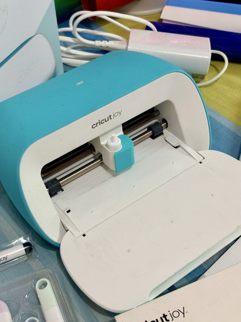 Cricut Joy crafting set (Category: Craft Supplies & Tools) located in Lipa City. Submitted by heyimdg (Listing ID 1468716698, Image 2). Description: CRICUT SET with ~3k worth of materials & kits Inclusions: Cricut Joy cutting machine Power cable Original Box Mirror Foil Card - Gold 1.8mm Acrylic Stick, 8” Rubberized HTV - Black Rubberized HTV - White Rubberized HTV - Gold Mini heat press Weeding tools Foil transfer kit 8mm rivet tool set G Hook 3