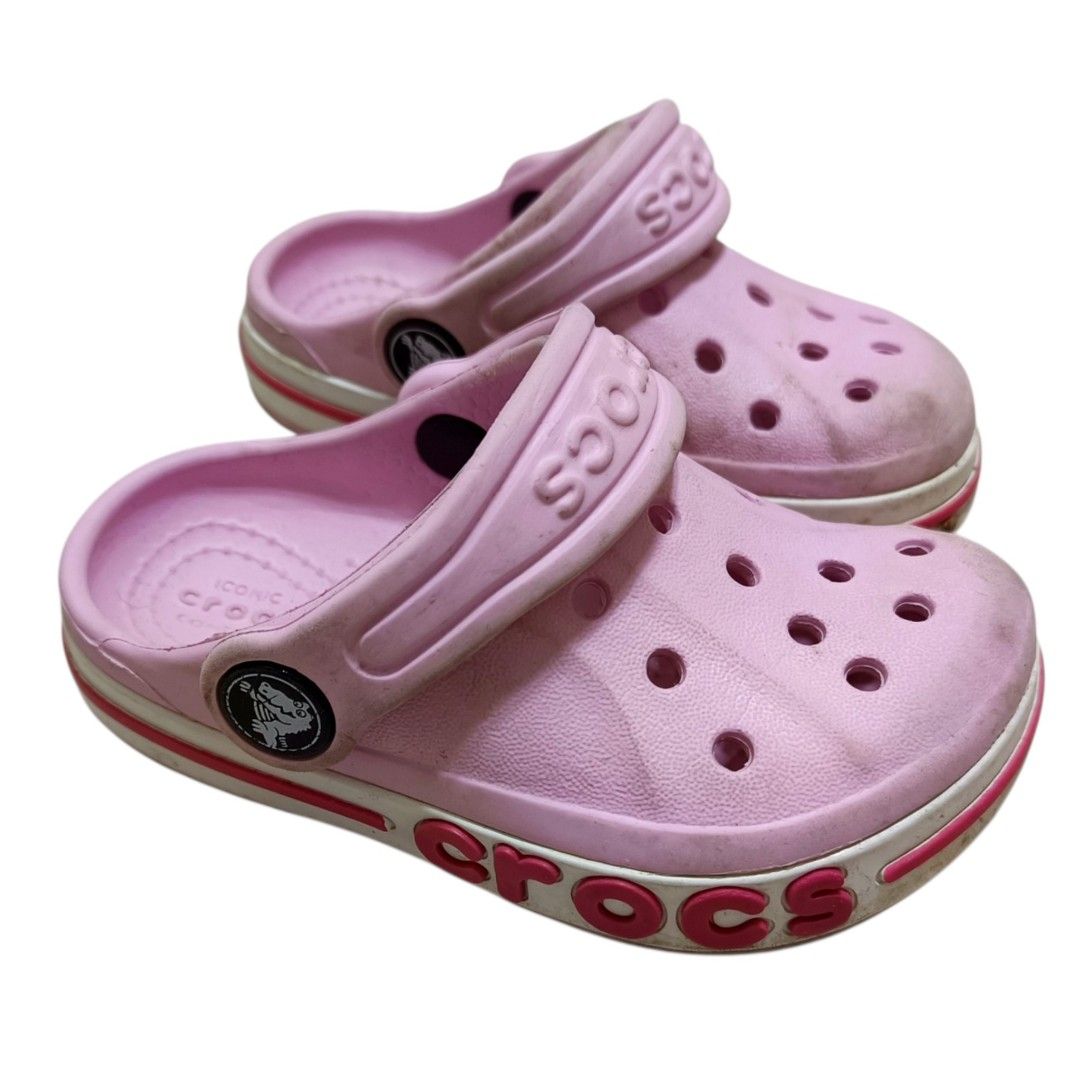 Crocs Kids Clogs Pink Size 6 (Category: Babies & Kids Fashion) located in Nasugbu. Submitted by staffpicks1515 (Listing ID 1468792428, Image 3). Description: - Item: Pink Crocs clogs for kids - Size: Kids Size 6 - Condition: Normal signs of wear with minor dirt on toes and soles (should wash off easily) - Features: Strap moves back and forth smoothly - Perfect for: Great daily slip-ons for little ones.