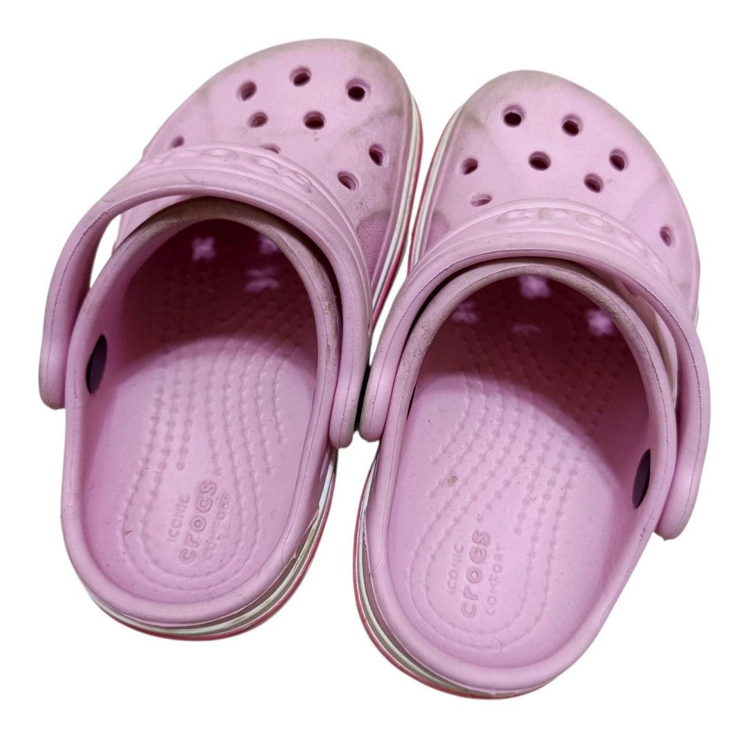 Crocs Kids Clogs Pink Size 6 (Category: Babies & Kids Fashion) located in Nasugbu. Submitted by staffpicks1515 (Listing ID 1468792428, Image 2). Description: - Item: Pink Crocs clogs for kids - Size: Kids Size 6 - Condition: Normal signs of wear with minor dirt on toes and soles (should wash off easily) - Features: Strap moves back and forth smoothly - Perfect for: Great daily slip-ons for little ones.