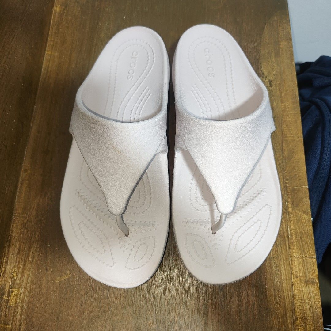 Crocs slippers (Category: Slippers and slides) located in Baguio. Submitted by virtualgarage.sale (Listing ID 1468892873, Image 1). Description: Please read Preloved authentic crocs. Size 8 women's Has a pinkish color 400 pesos .
