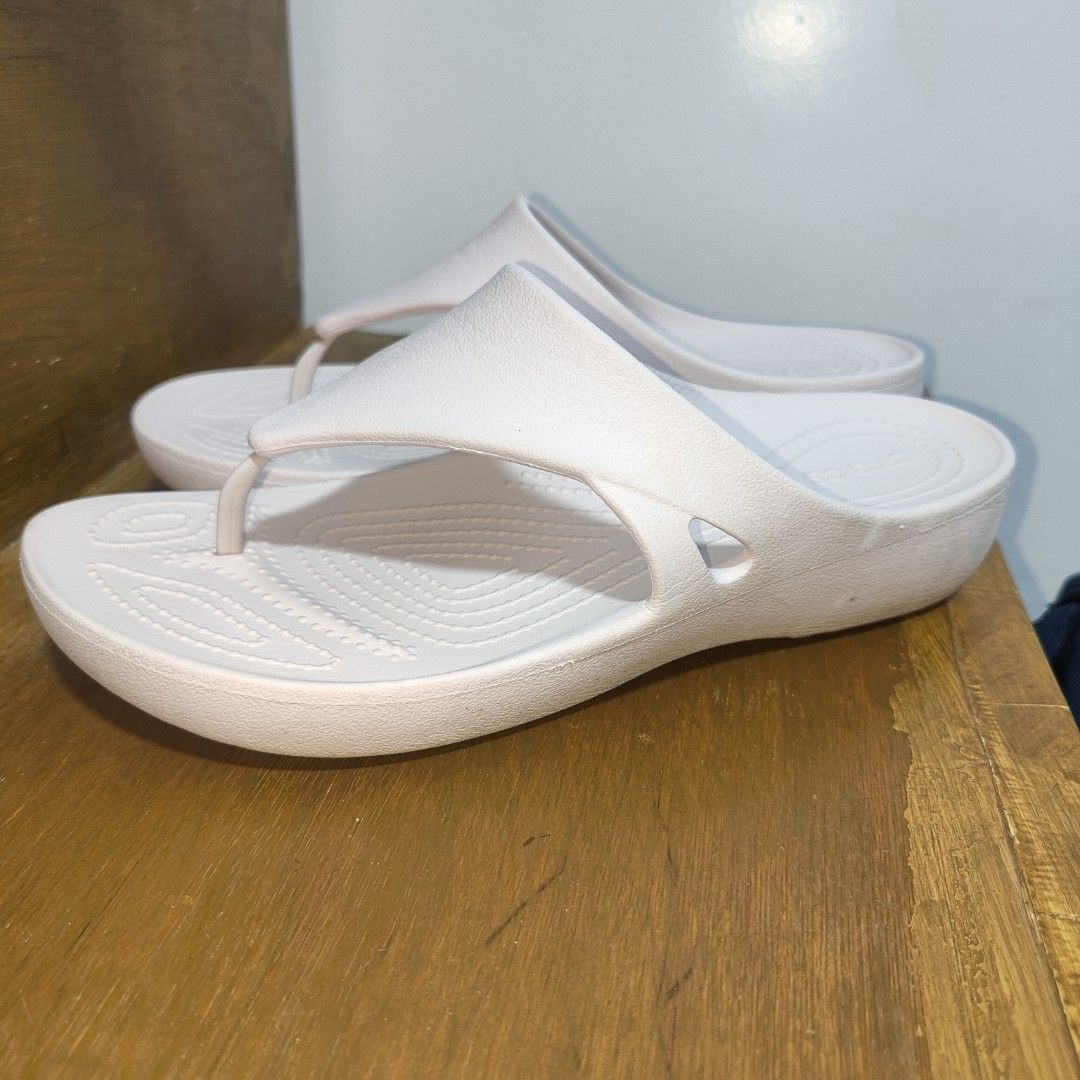 Crocs slippers (Category: Slippers and slides) located in Baguio. Submitted by virtualgarage.sale (Listing ID 1468892873, Image 2). Description: Please read Preloved authentic crocs. Size 8 women's Has a pinkish color 400 pesos .