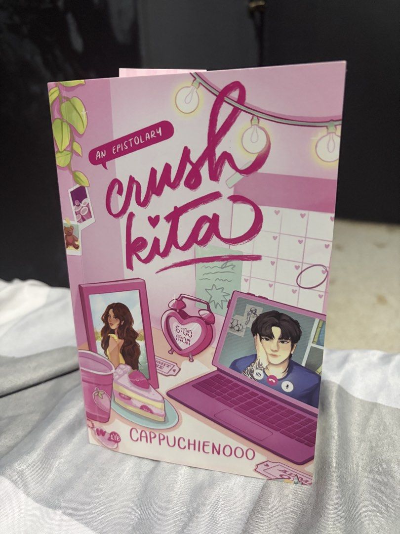 Crush Kita by Cappuchienooo (Category: Storybooks) located in Cagayan de Oro. Submitted by coffee.bin (Listing ID 1468828504, Image 1). Description: In good condition. Original copy bought from Precious Pages Bookstore. Prints that come with the book are all complete. (2 bookmarks, 2 large photos, 2 small photocards) Message for more pictures of the book. Will be wrapping the book in plastic cover before shipping. .